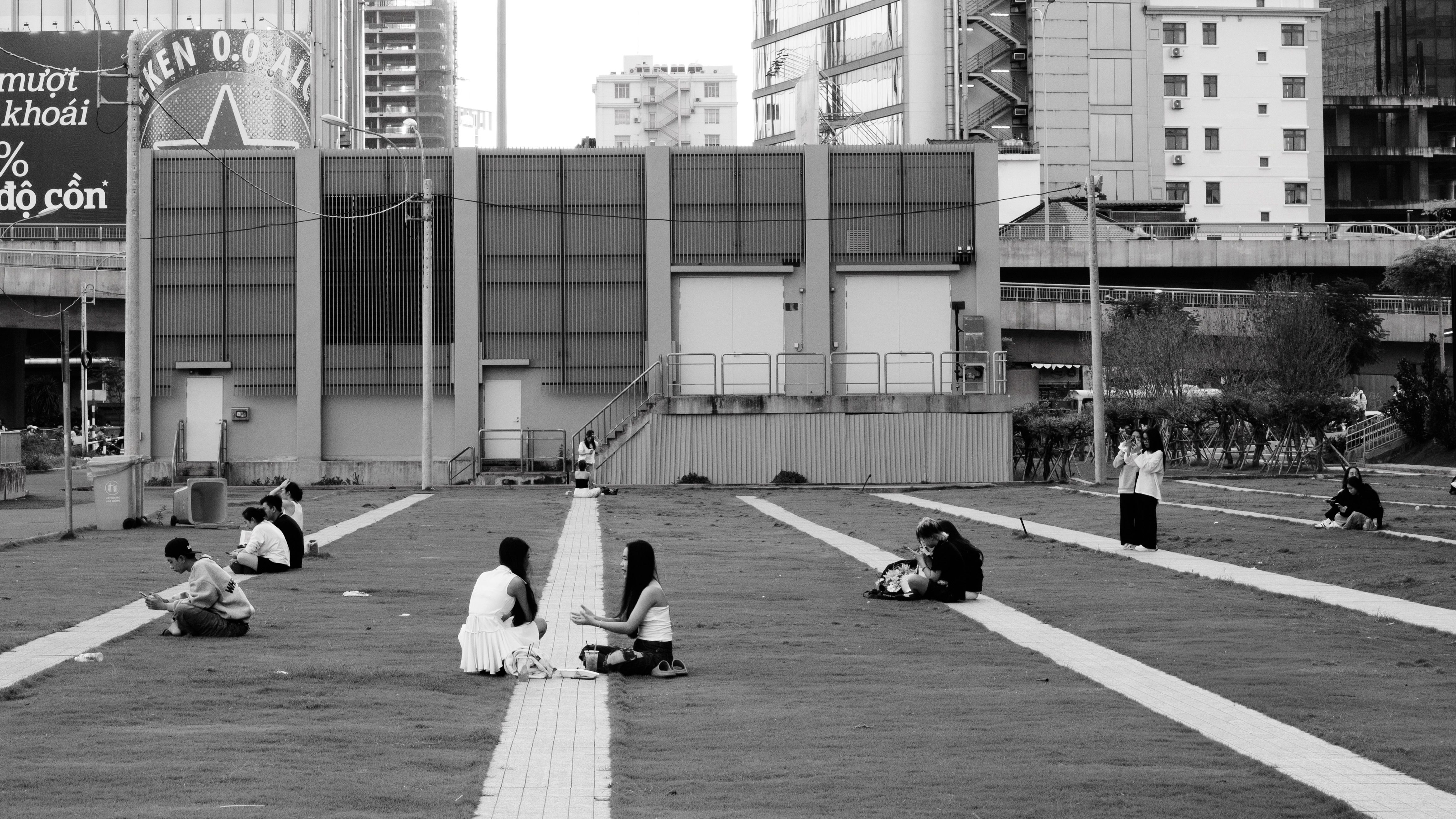 People Relaxing in Urban Park Setting · Free Stock Photo