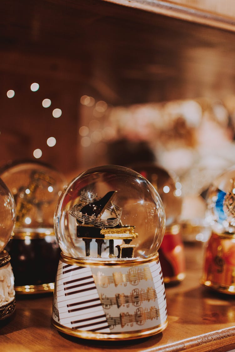 Magic Glass Snow Globe In Christmas Market