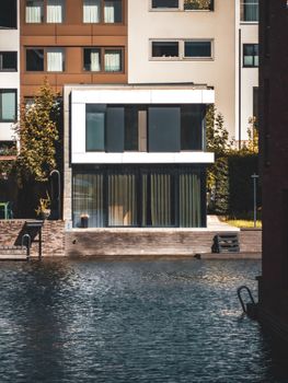 Contemporary urban house by the canal with modern architecture design.