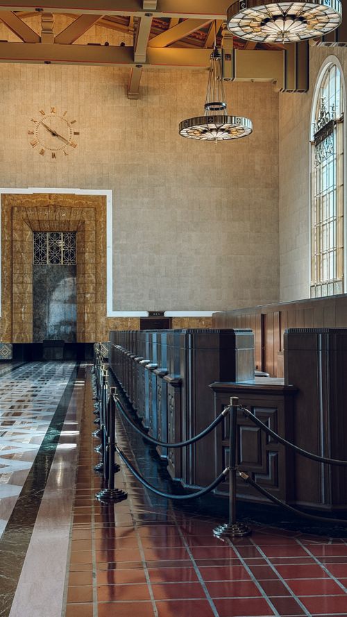 Free Elegant vintage train station interior with natural light and art deco design. Stock Photo