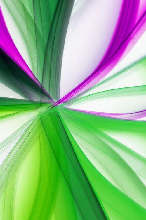 Free Abstract image of vibrant green and purple swirls on a white background, representing modern art. Stock Photo