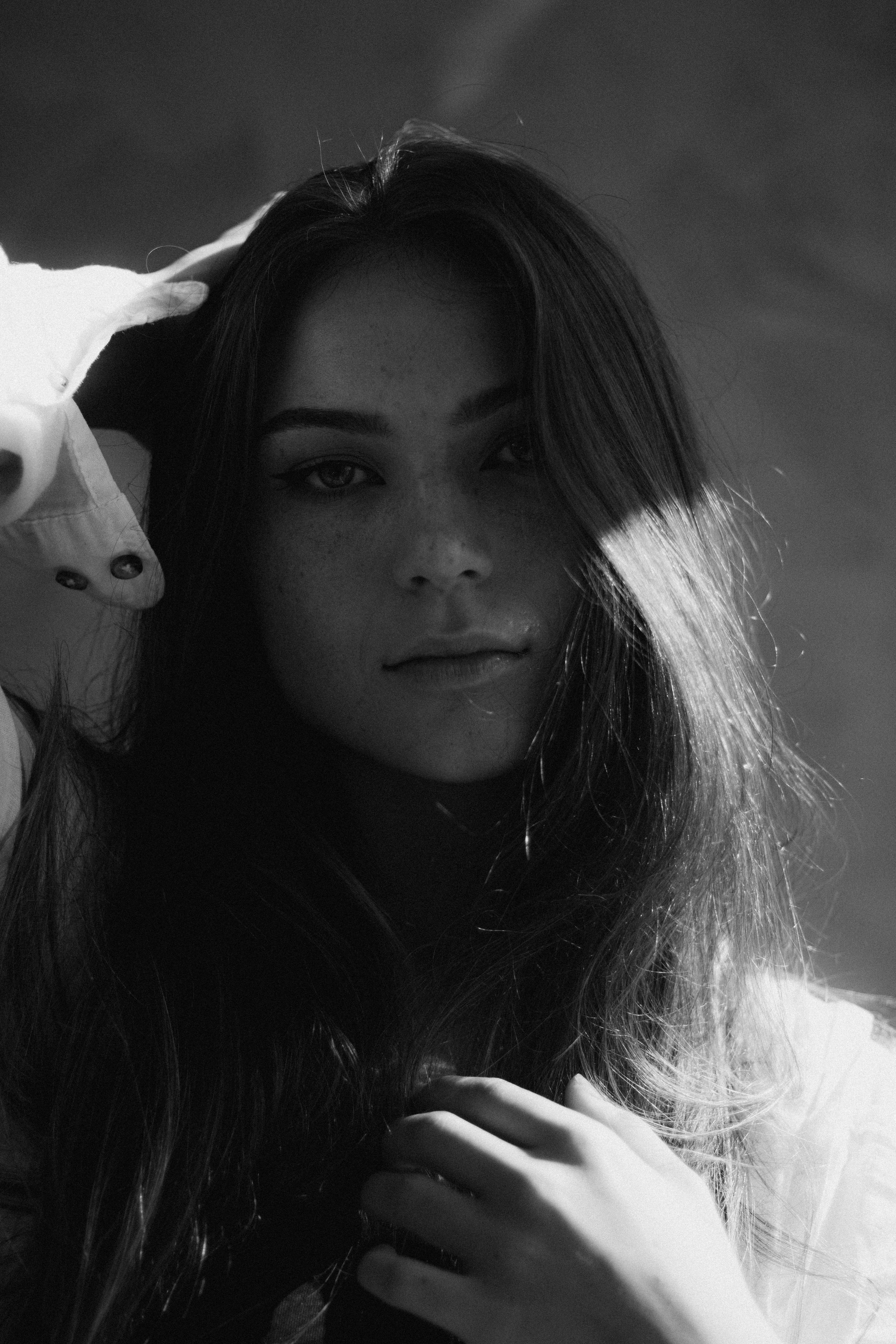 Portrait of a Woman with Soft Sunlight · Free Stock Photo