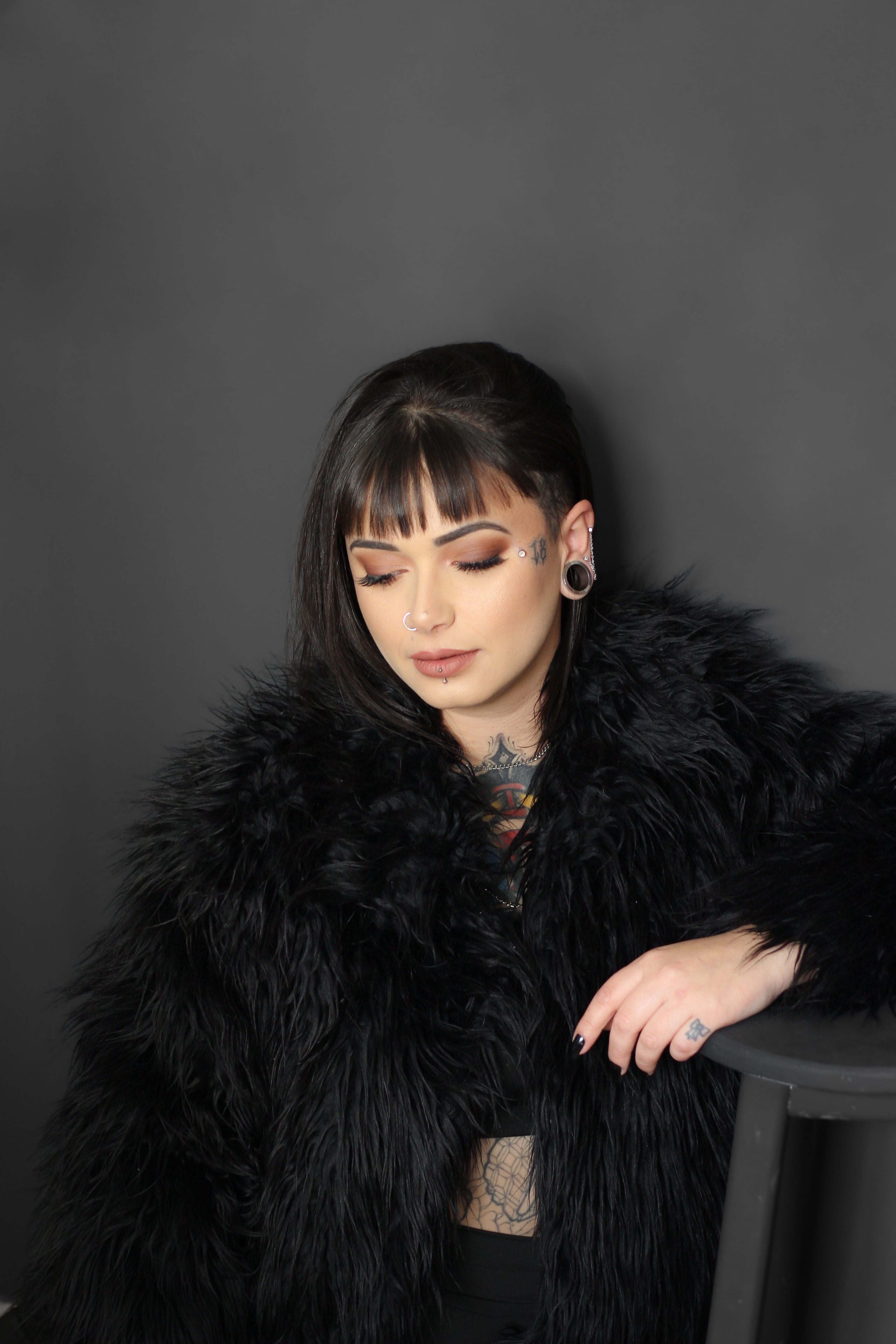 Elegant Portrait of Woman in Black Fur Coat · Free Stock Photo