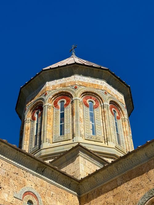 Free A beautiful church dome in Sighnaghi, Kakheti, Georgia, with intricate designs under a clear blue sky. Stock Photo