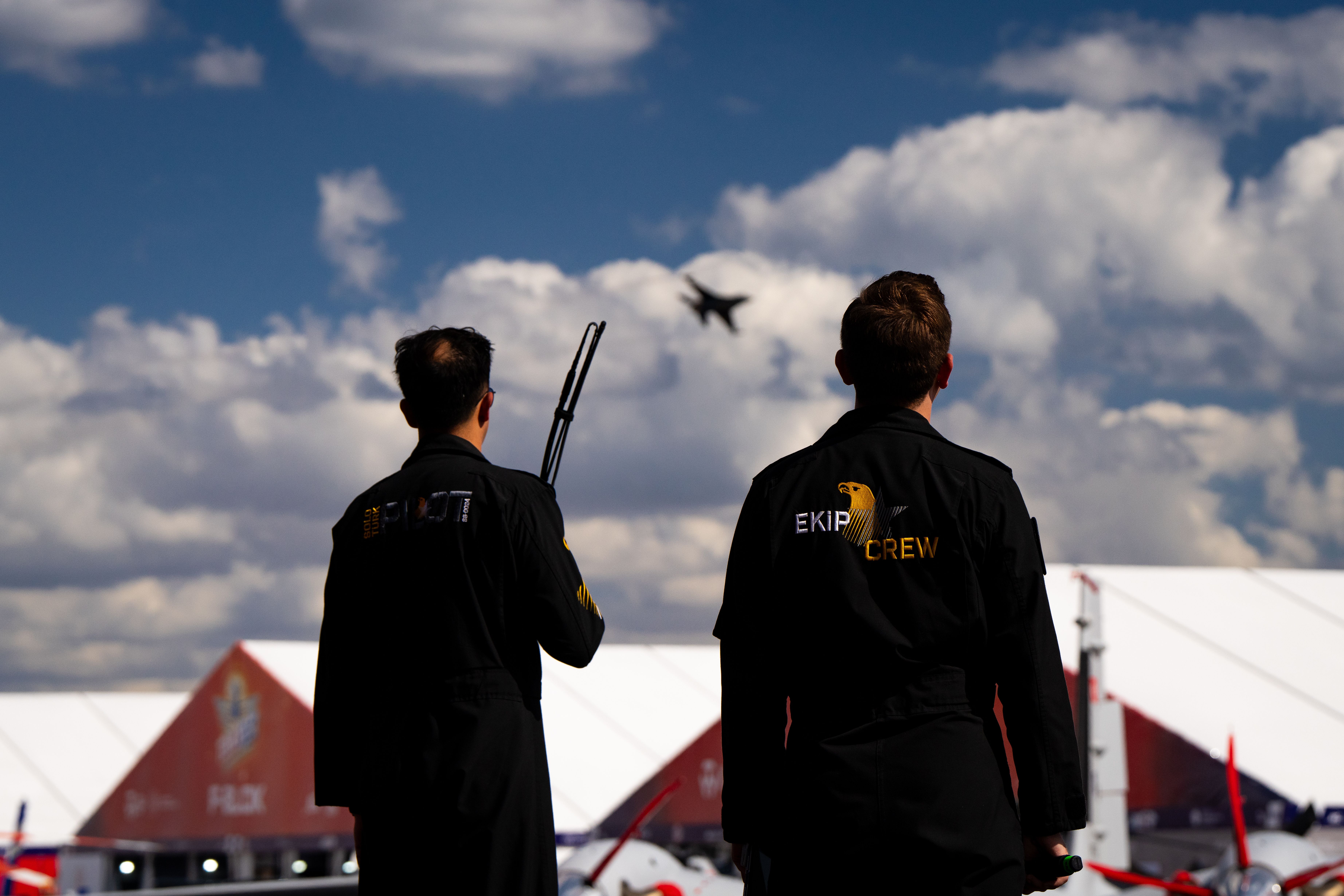 Airshow Crew Watching Jet Performance Outdoors · Free Stock Photo