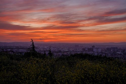 Free A breathtaking sunset over the city of Bursa, Türkiye, with vivid colors lighting up the sky. Stock Photo