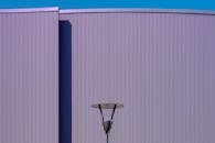 Modern Architectural Facade with Streetlamp