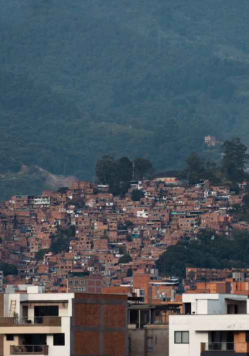 Free Diverse architecture in Medellín, Colombia, showcasing urban development against lush mountains. Stock Photo