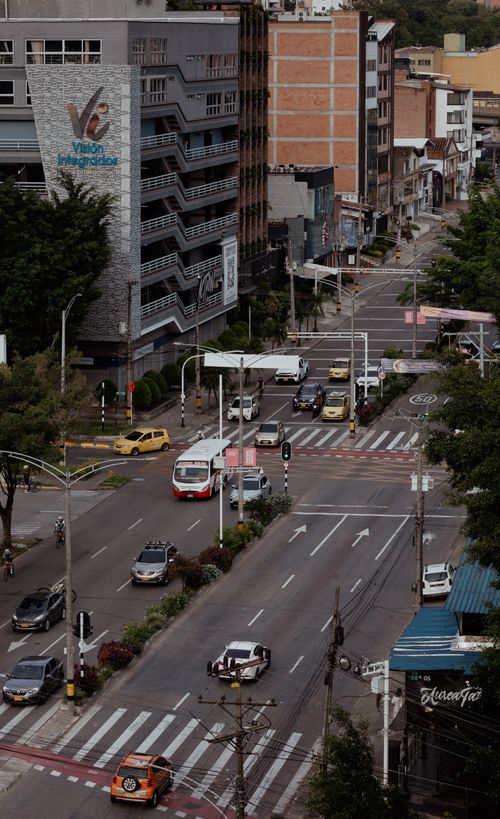 Free Dynamic Medellín street scene from above, capturing urban life and traffic. Stock Photo
