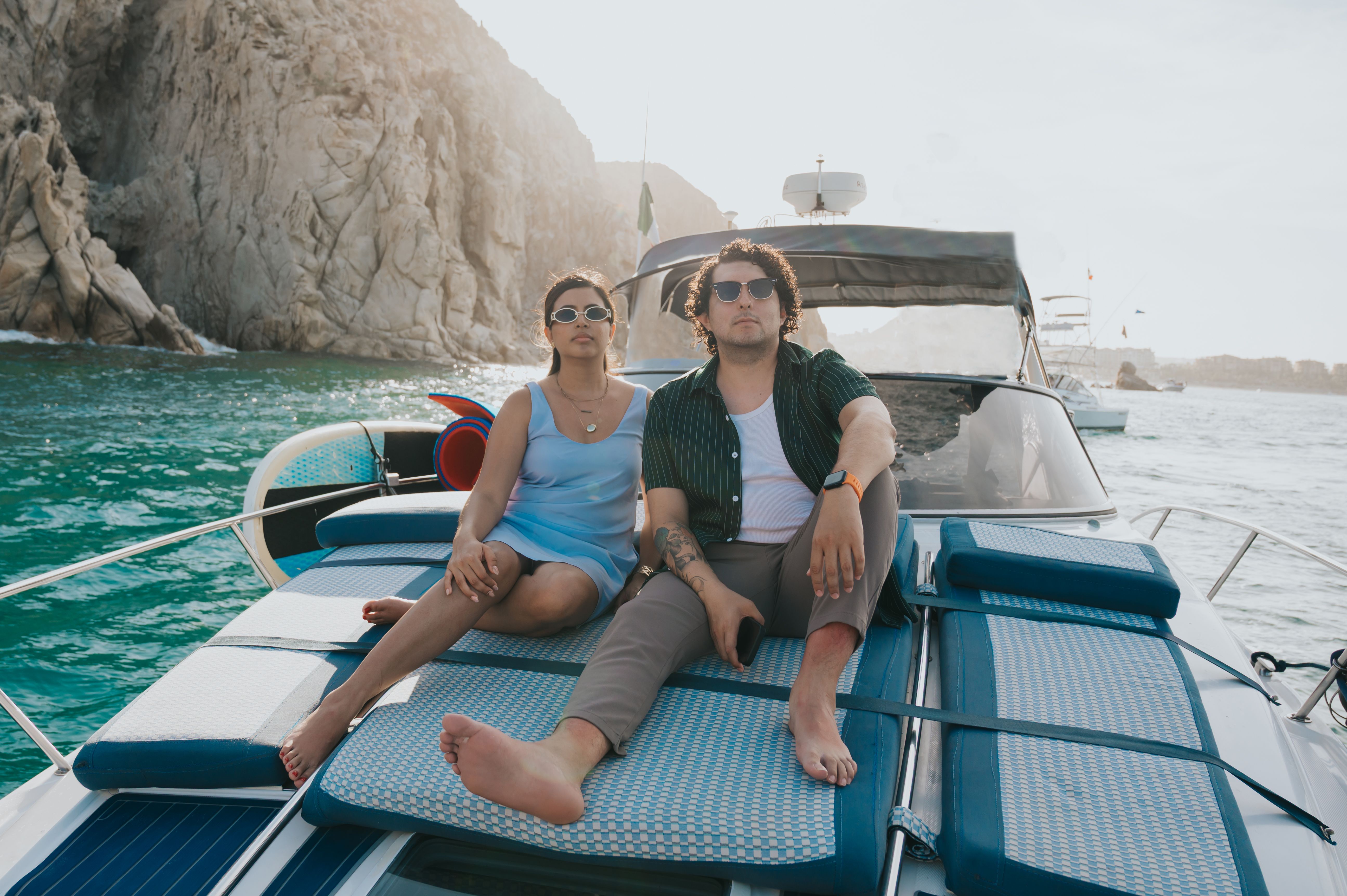 People relaxing on a yacht deck