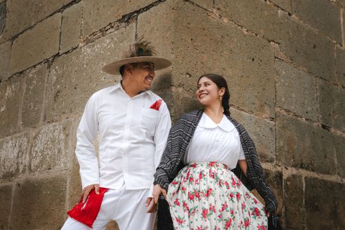 Free Smiling couple in traditional attire celebrating culture in Oaxaca City, Mexico. Stock Photo