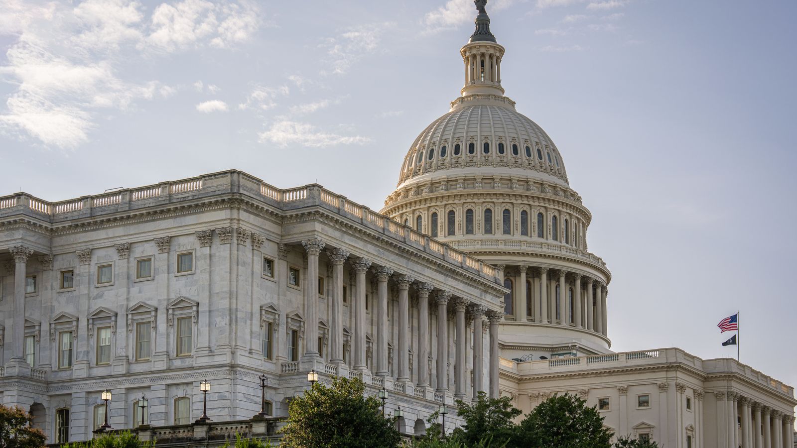 Stunning daytime view of the US Capitol Building in Washington DC, showcasing its architectural grandeur and iconic dome.