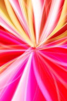Energetic abstract image with vibrant pink and yellow light streaks creating a dynamic visual effect.