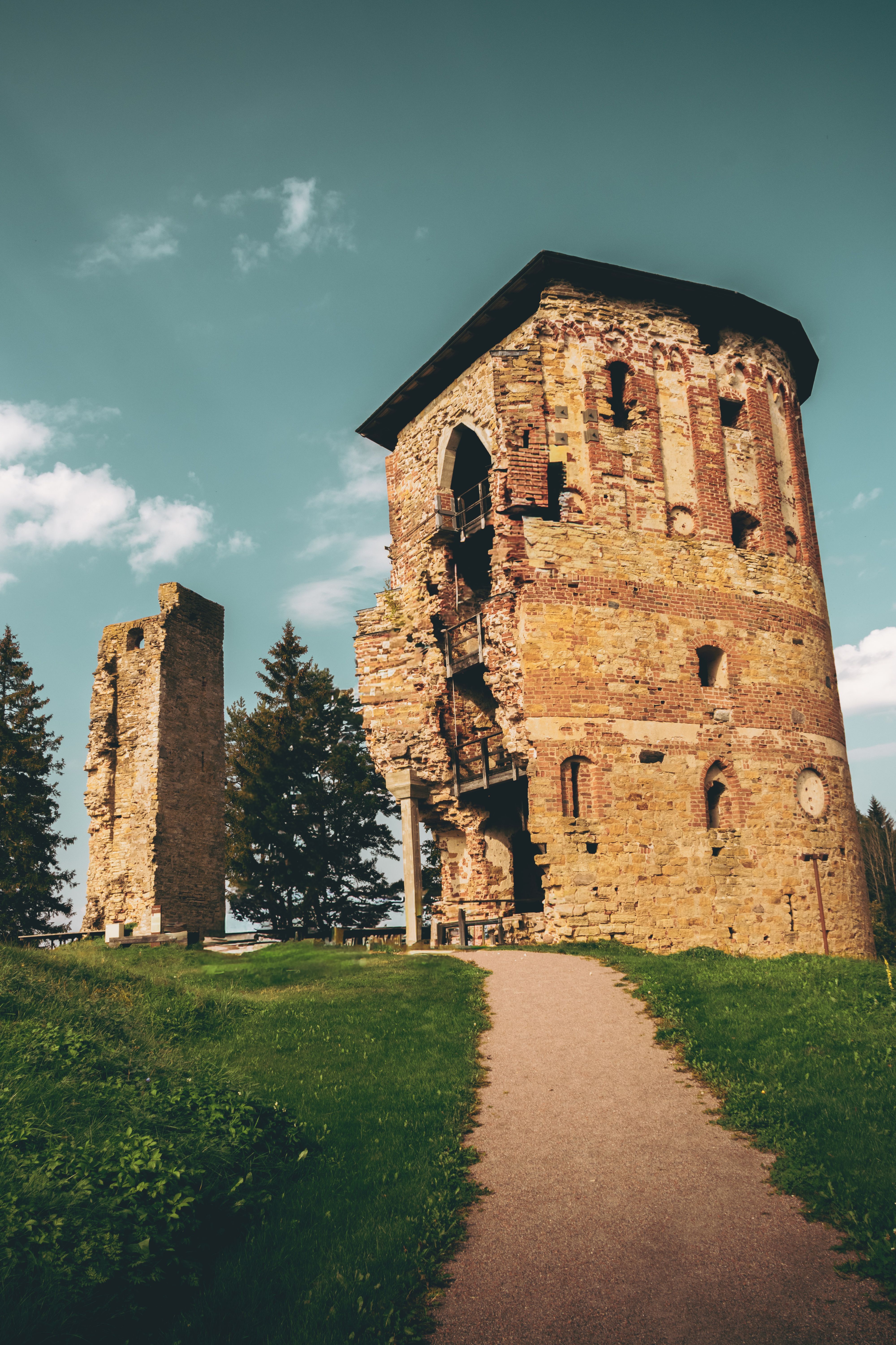 Ancient Stone Tower Ruins in Scenic Park · Free Stock Photo