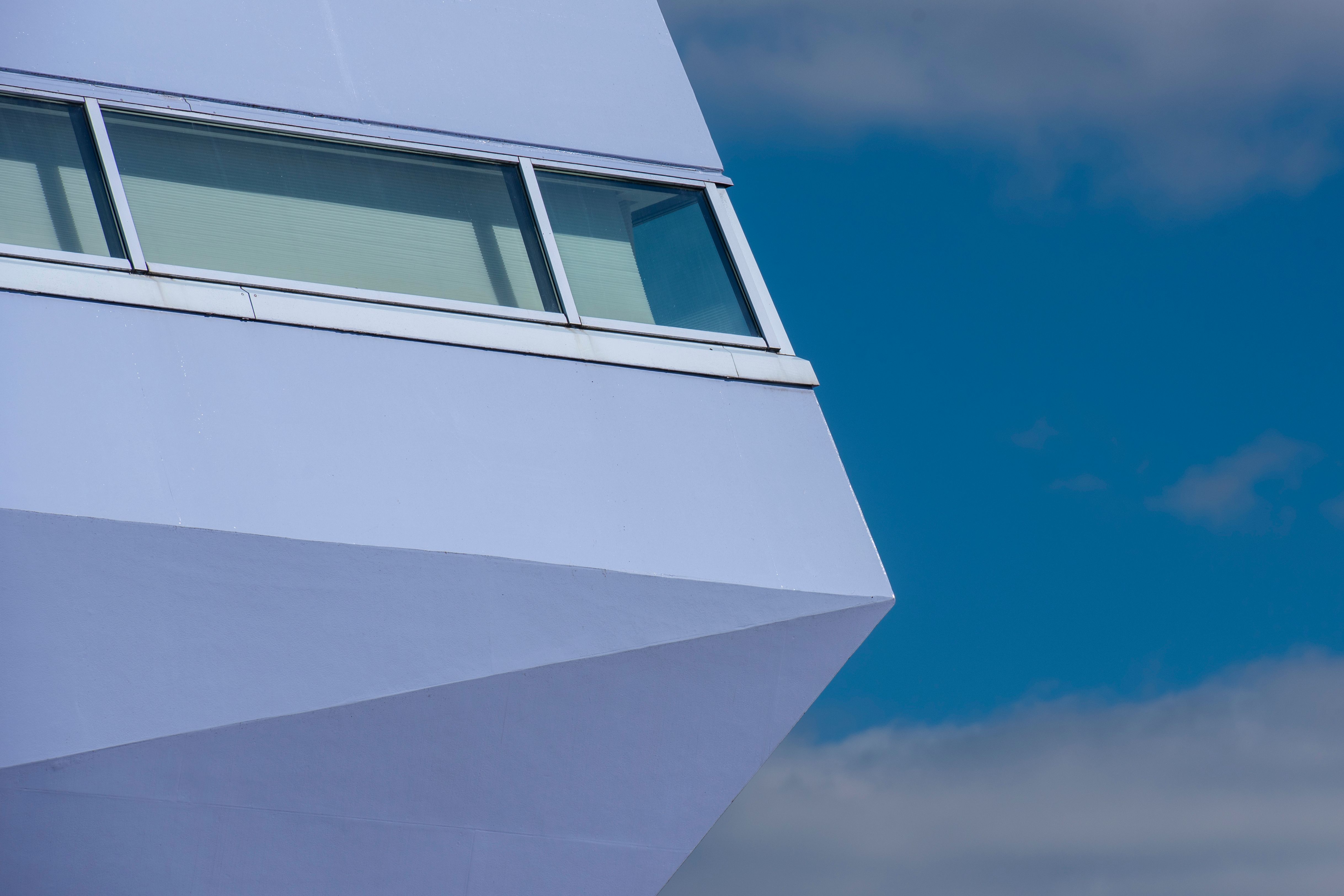 Modern Architecture Facade Against Blue Sky · Free Stock Photo