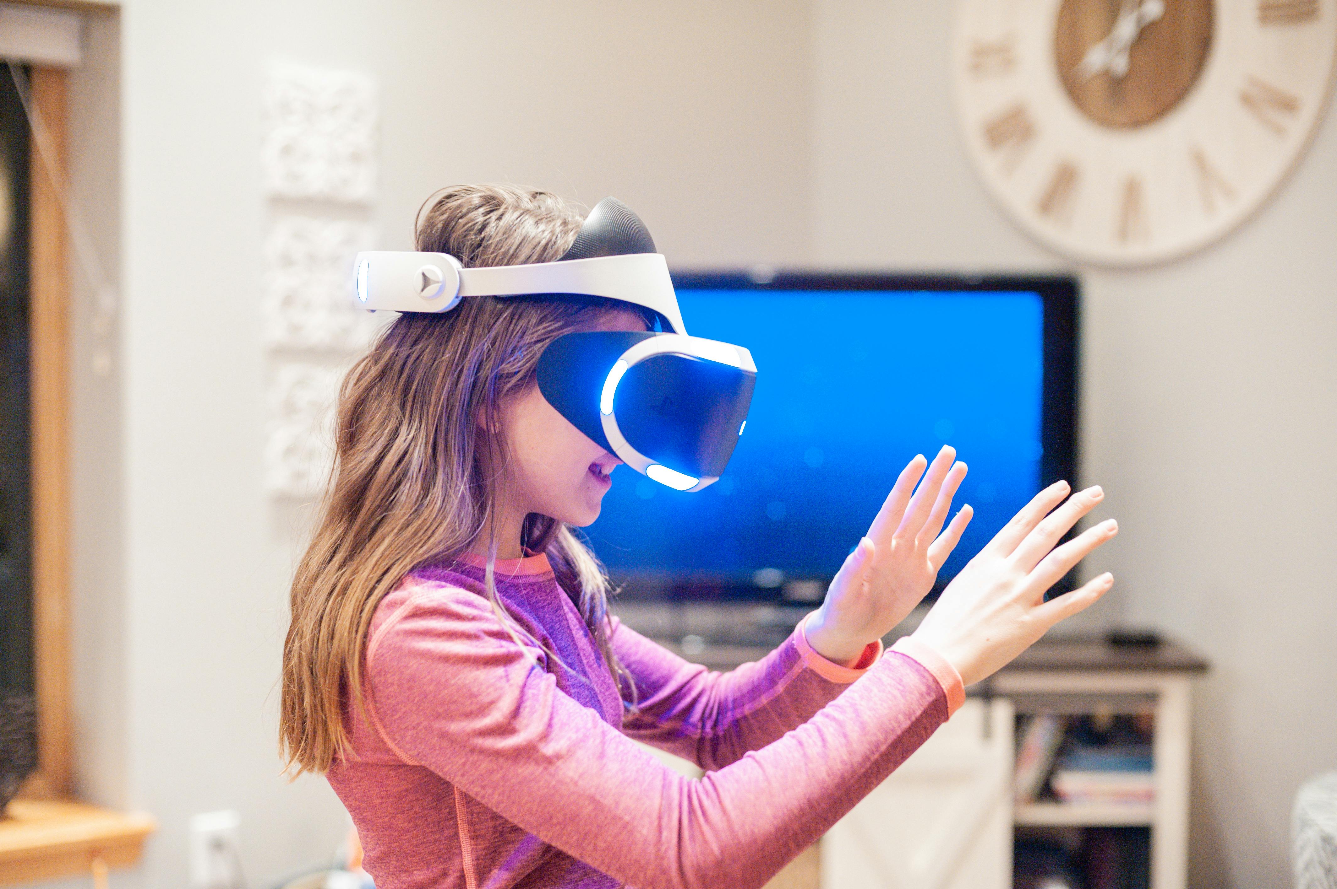 a woman wearing vr goggles