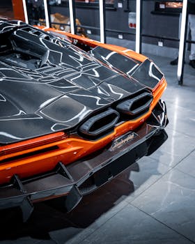 Close-up of luxury orange sports car with carbon fiber detailing in Ankara, Türkiye.