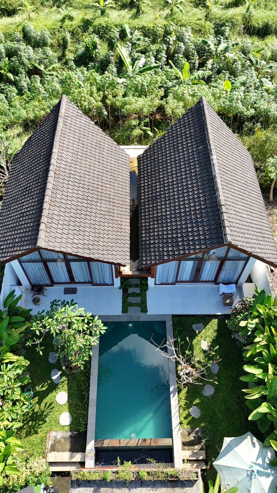 Aerial view of Balinese villas with pool