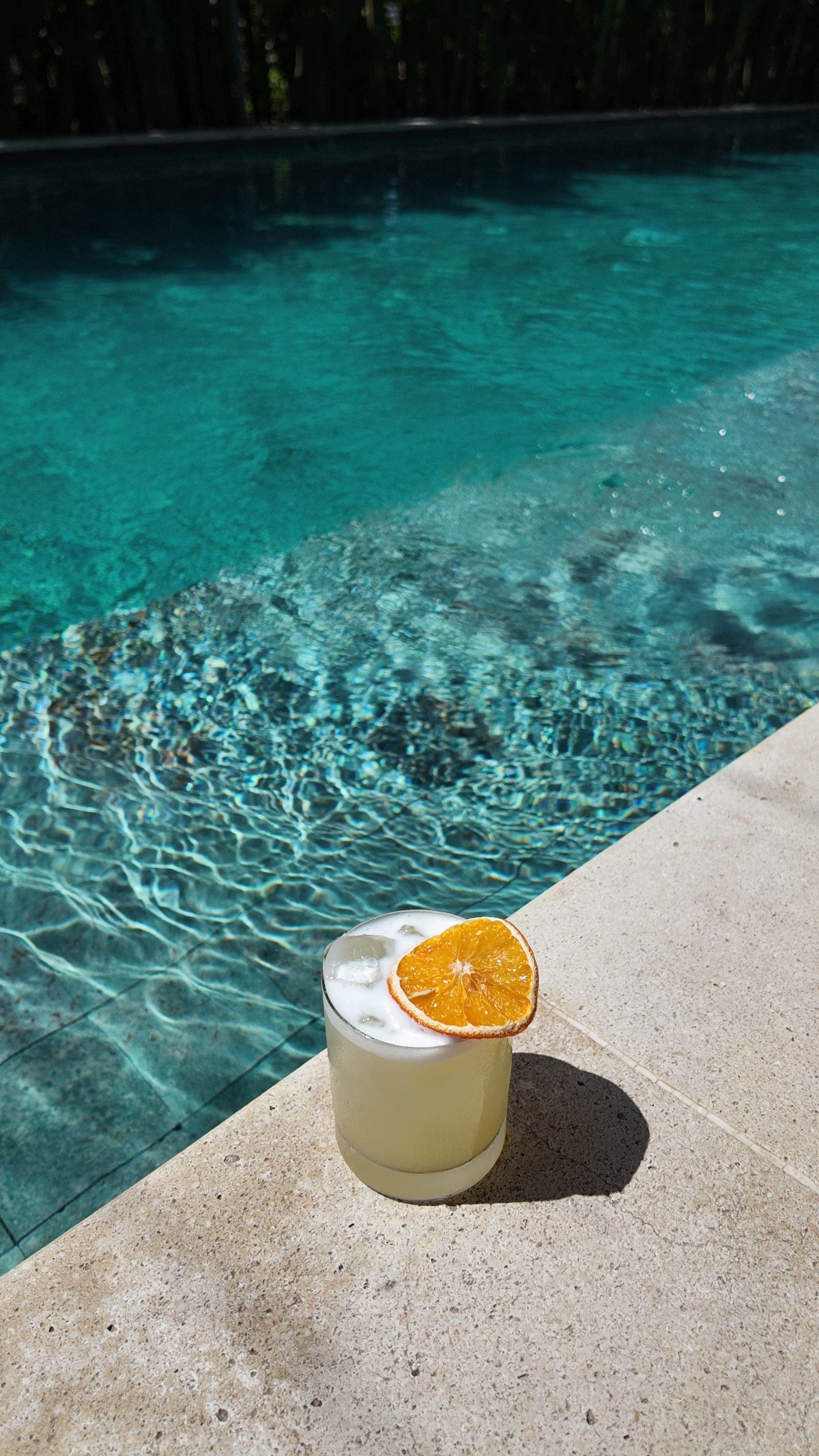 Relaxing Poolside Lounge with Cocktail · Free Stock Photo