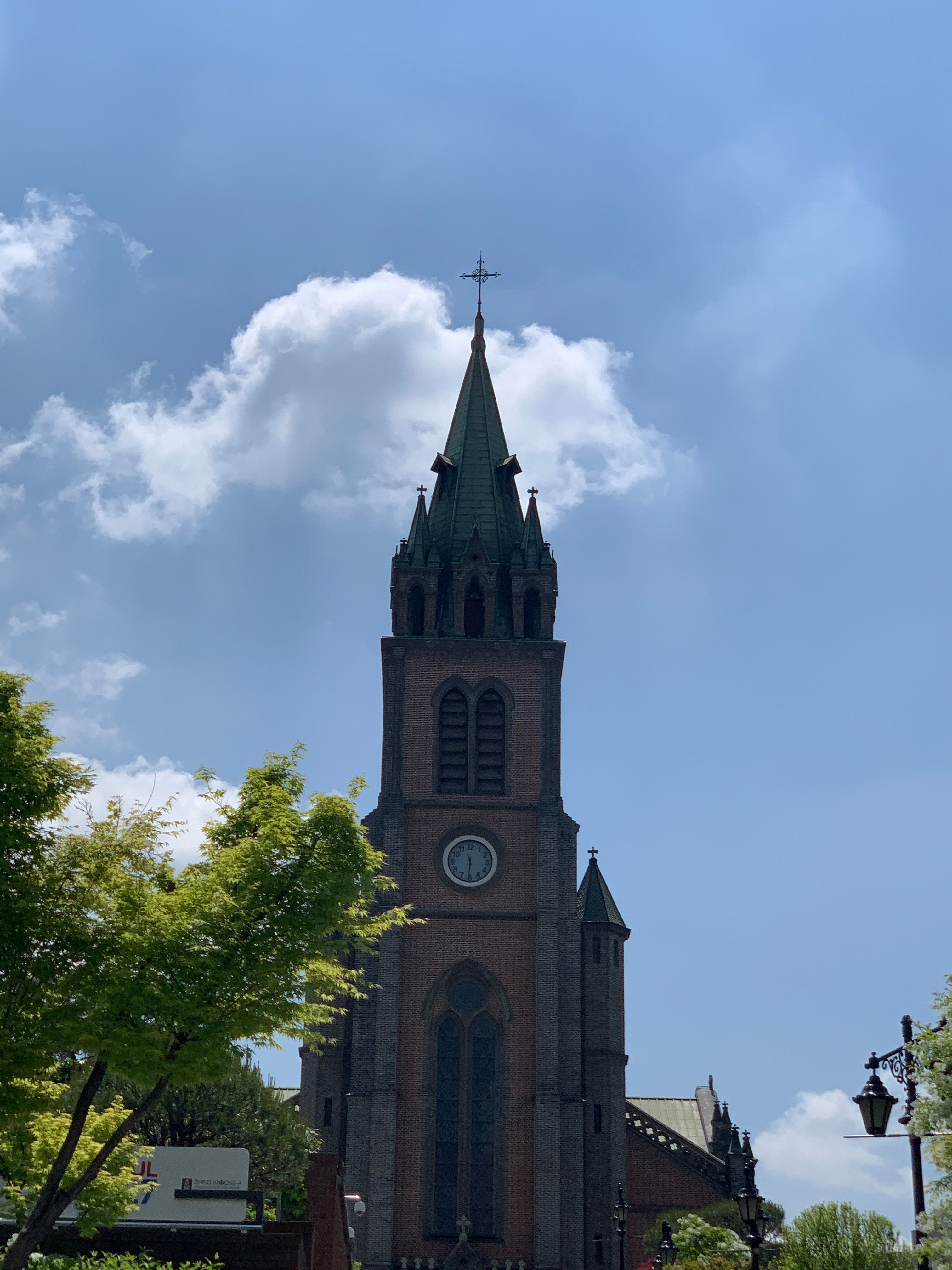 Gothic Cathedral Tower Against Blue Sky · Free Stock Photo