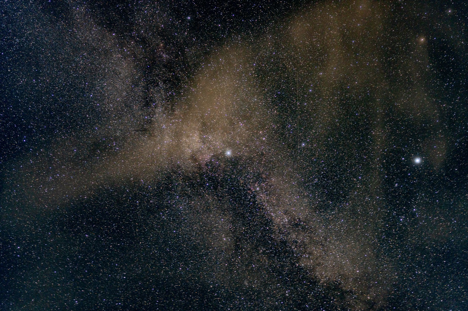 A breathtaking view of the night sky, showcasing an array of distant stars and galaxies.