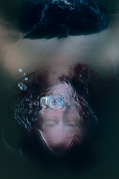 Woman on the Body of Water