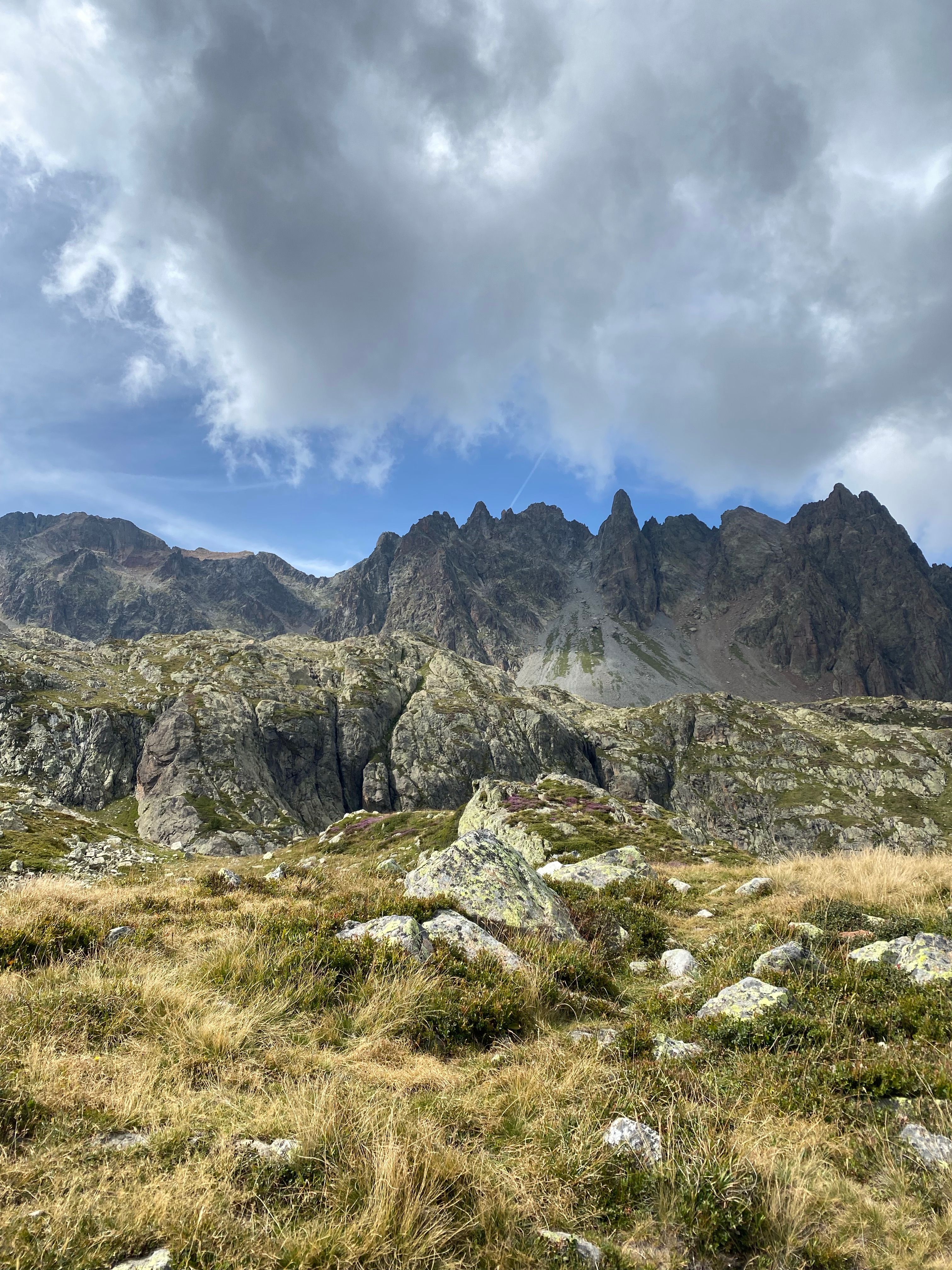 Dramatic Mountain Landscape Under Cloudy Sky · Free Stock Photo