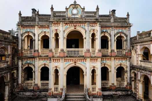 A historic French colonial mansion showcasing preserved architecture in Lào Cai, Vietnam.