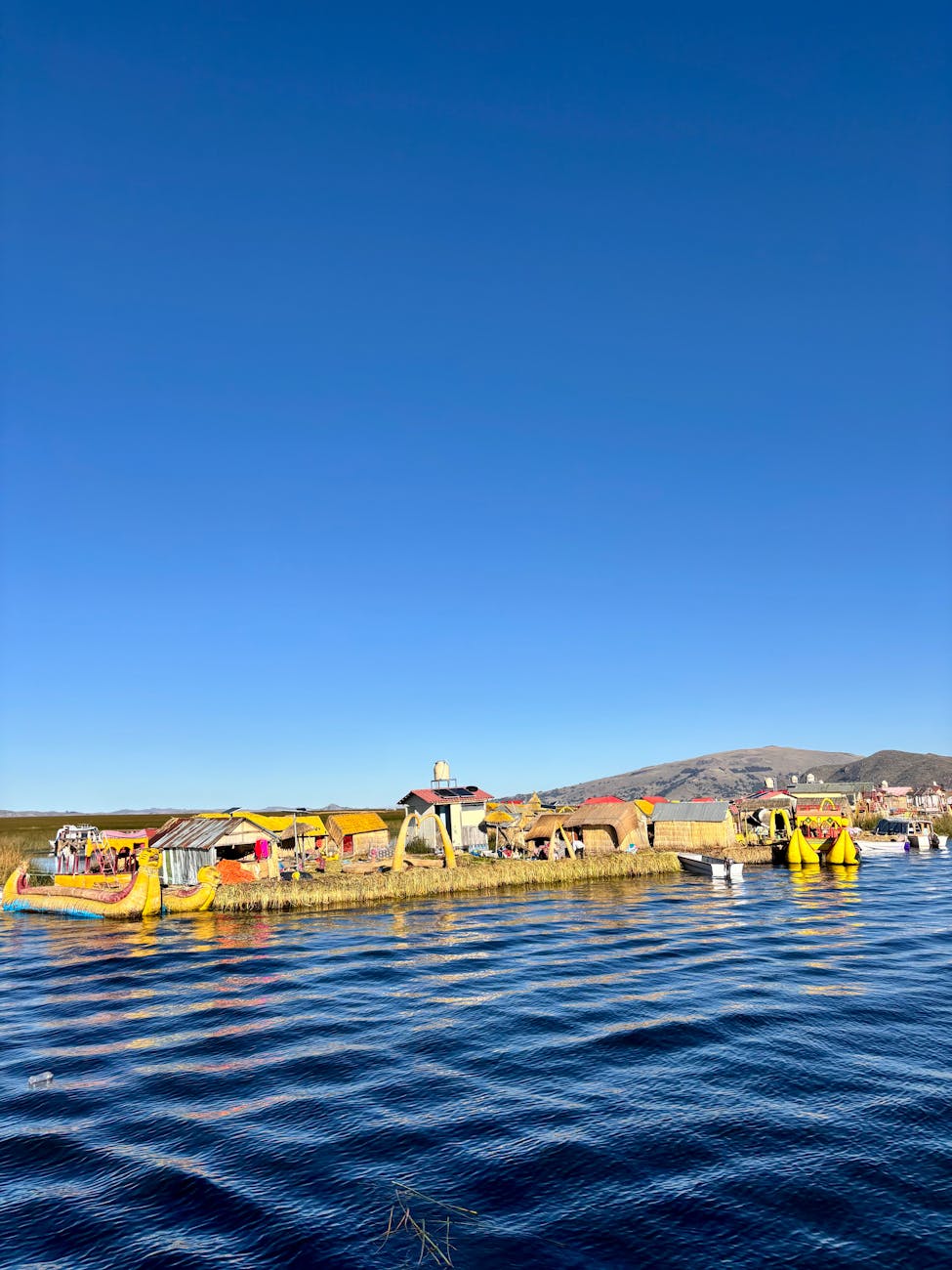 Uros Floating Islands Cattle-Call Tours (Choose Taquile or Amantani)