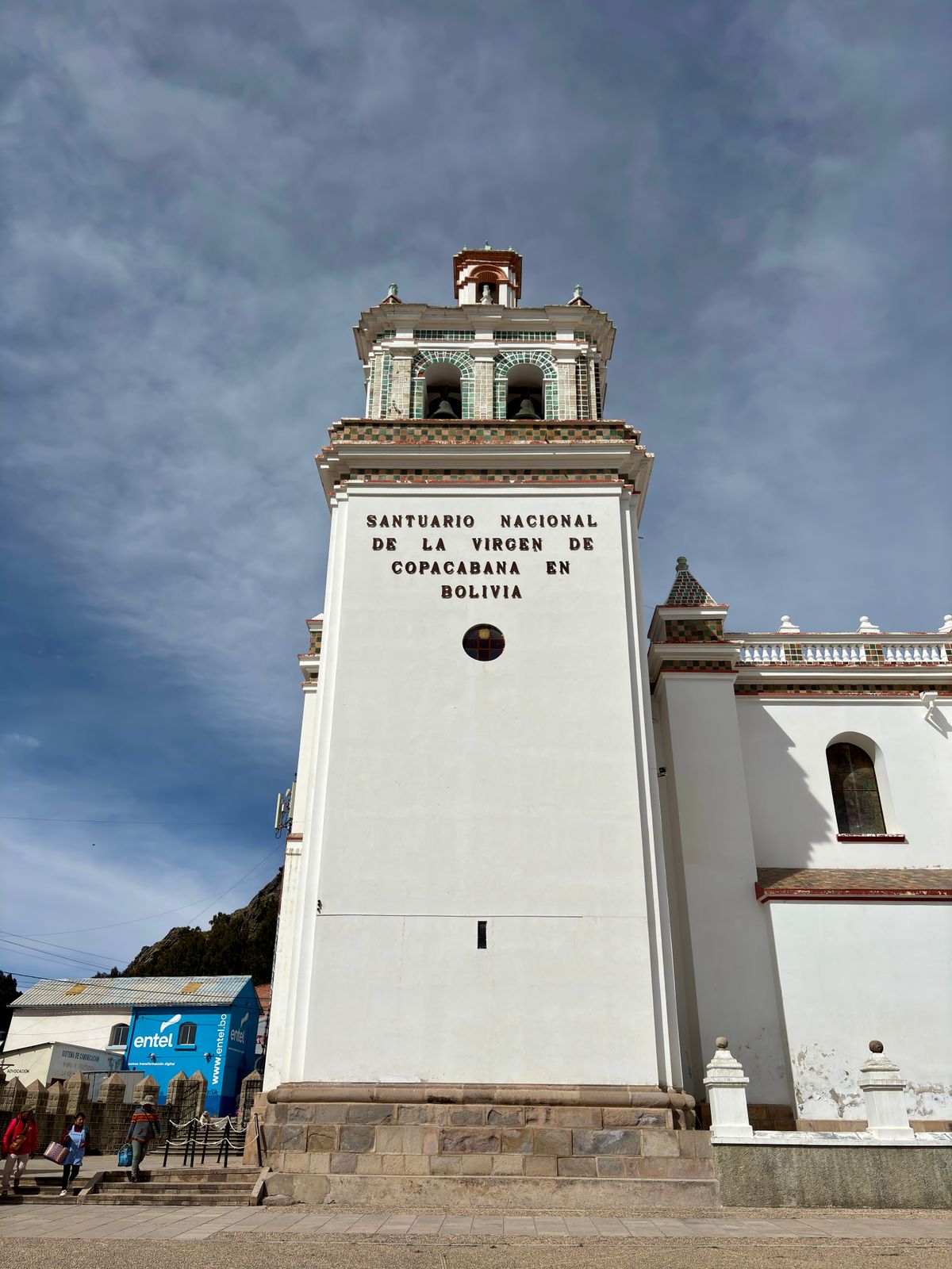 White Moorish domes of the Copacabana basilica against blue sky