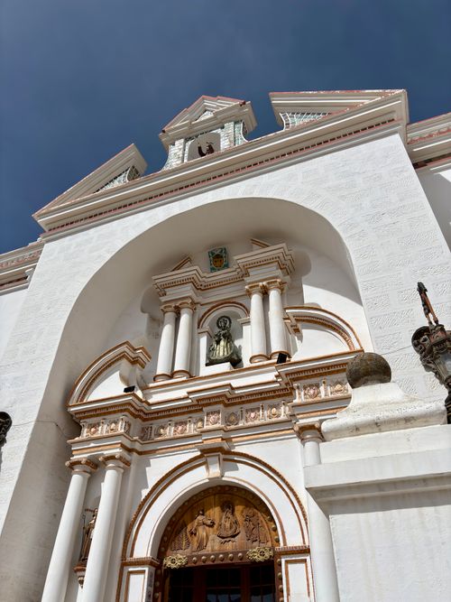 Free The intricate facade of the Basilica of Our Lady of Copacabana in Bolivia under a clear blue sky. Stock Photo