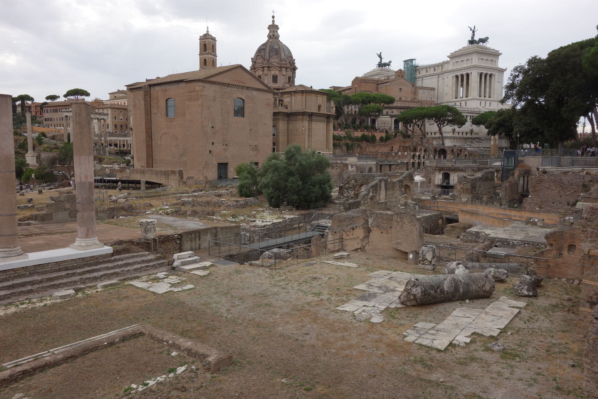 Explore the historic ruins of the Roman Forum in Rome, Italy, featuring ancient architecture and columns.
