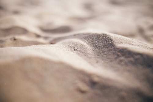 Shallow Focus Photo of Gray Sand