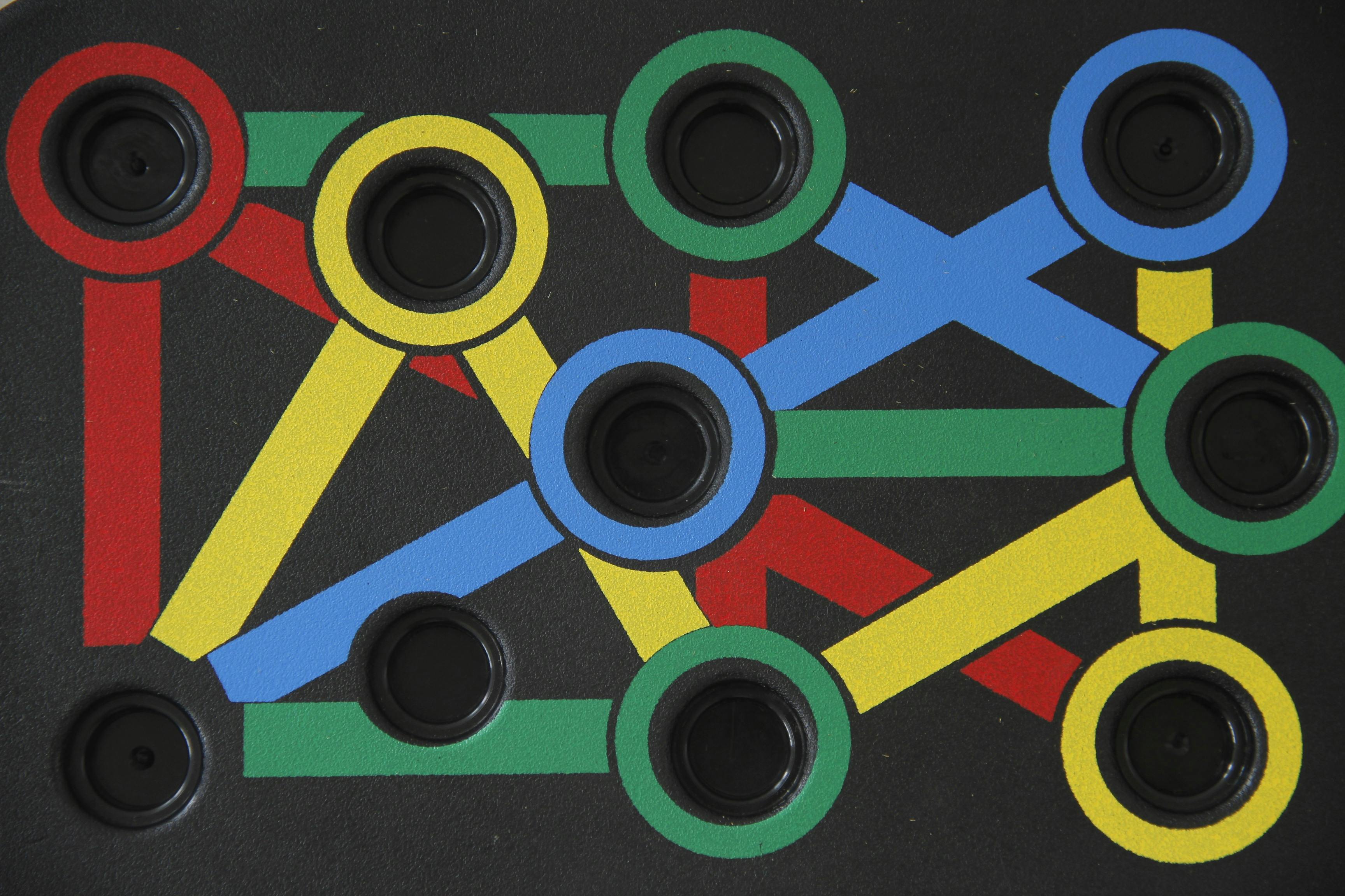 Colorful geometric abstract art featuring interlinked circles and lines on a dark background.