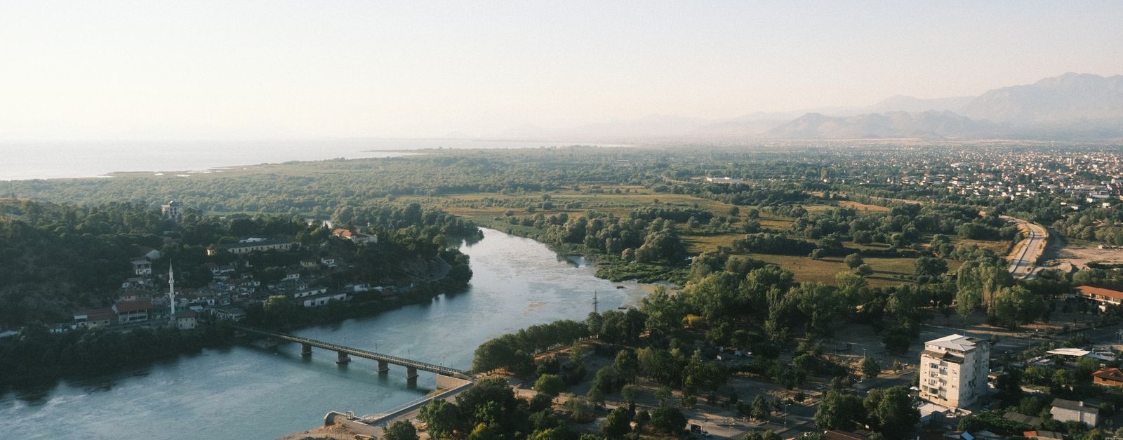 A beautiful aerial view capturing the serene landscape and river in Shkodra, Albania.