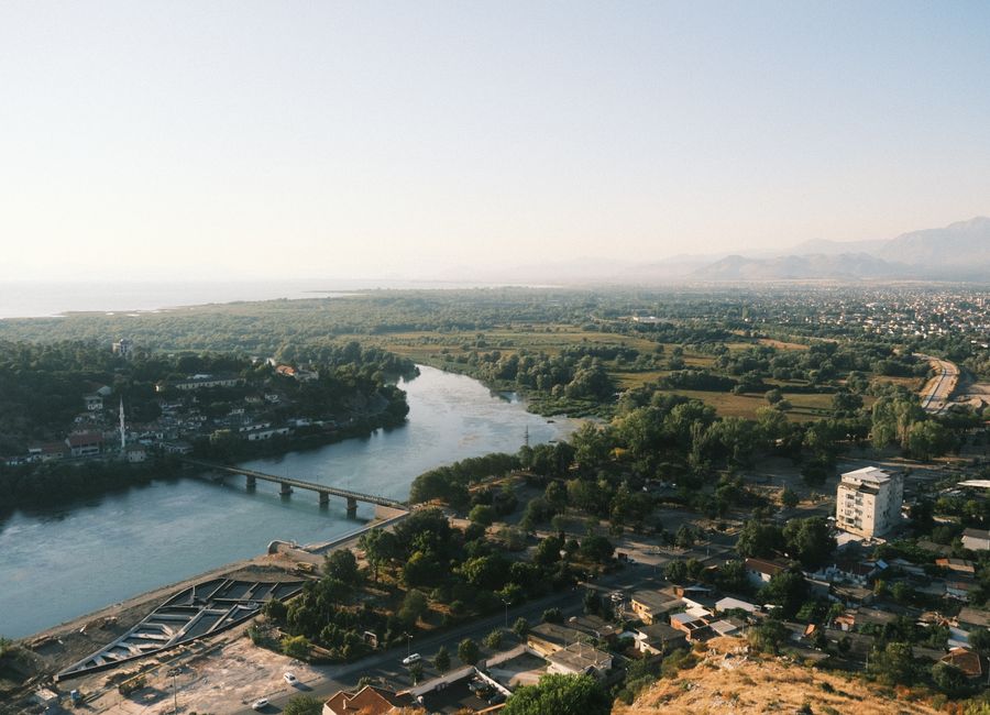 A beautiful aerial view capturing the serene landscape and river in Shkodra, Albania.