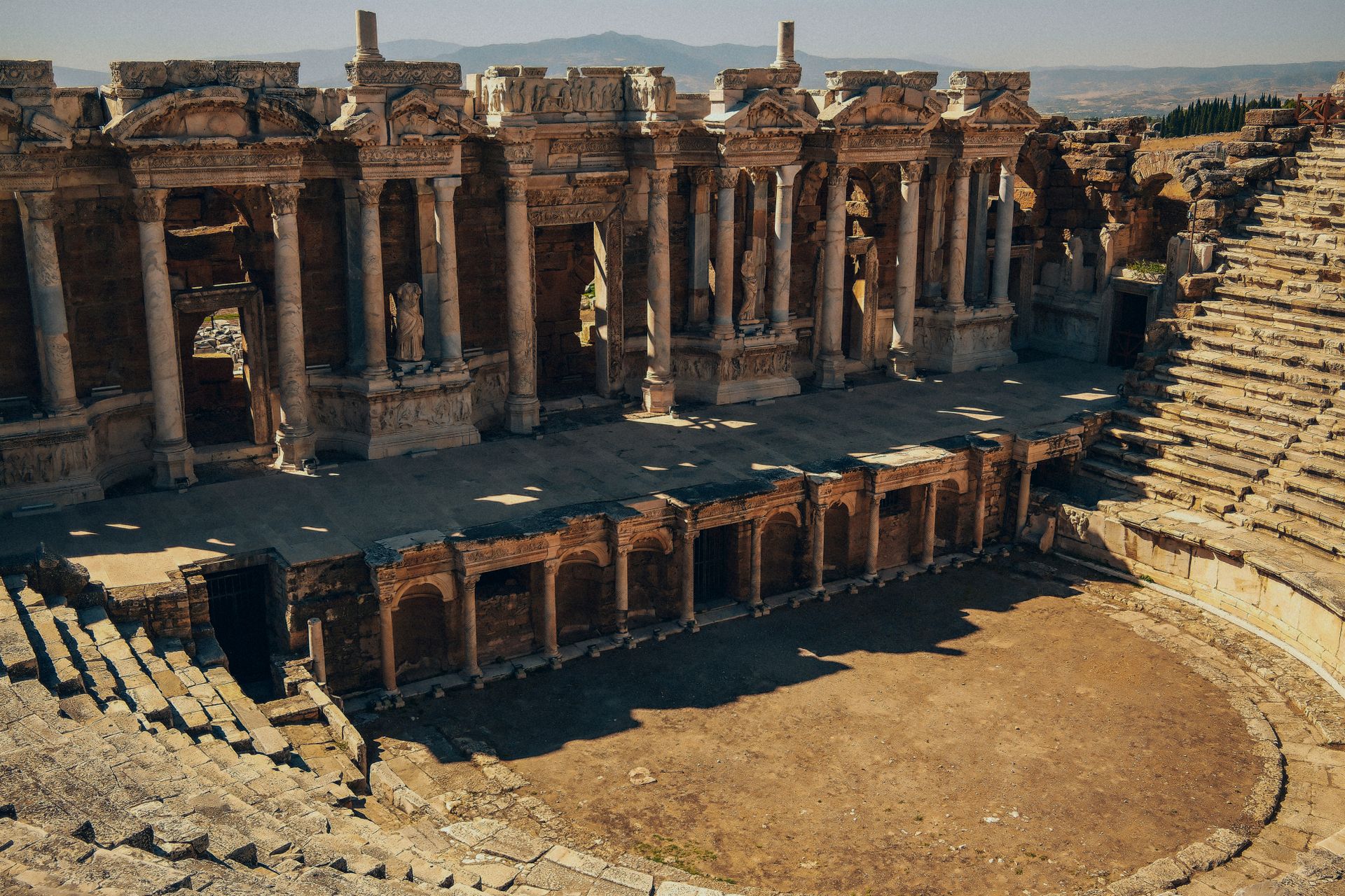 Historic Roman amphitheater in Hierapolis, showcasing ancient architecture.