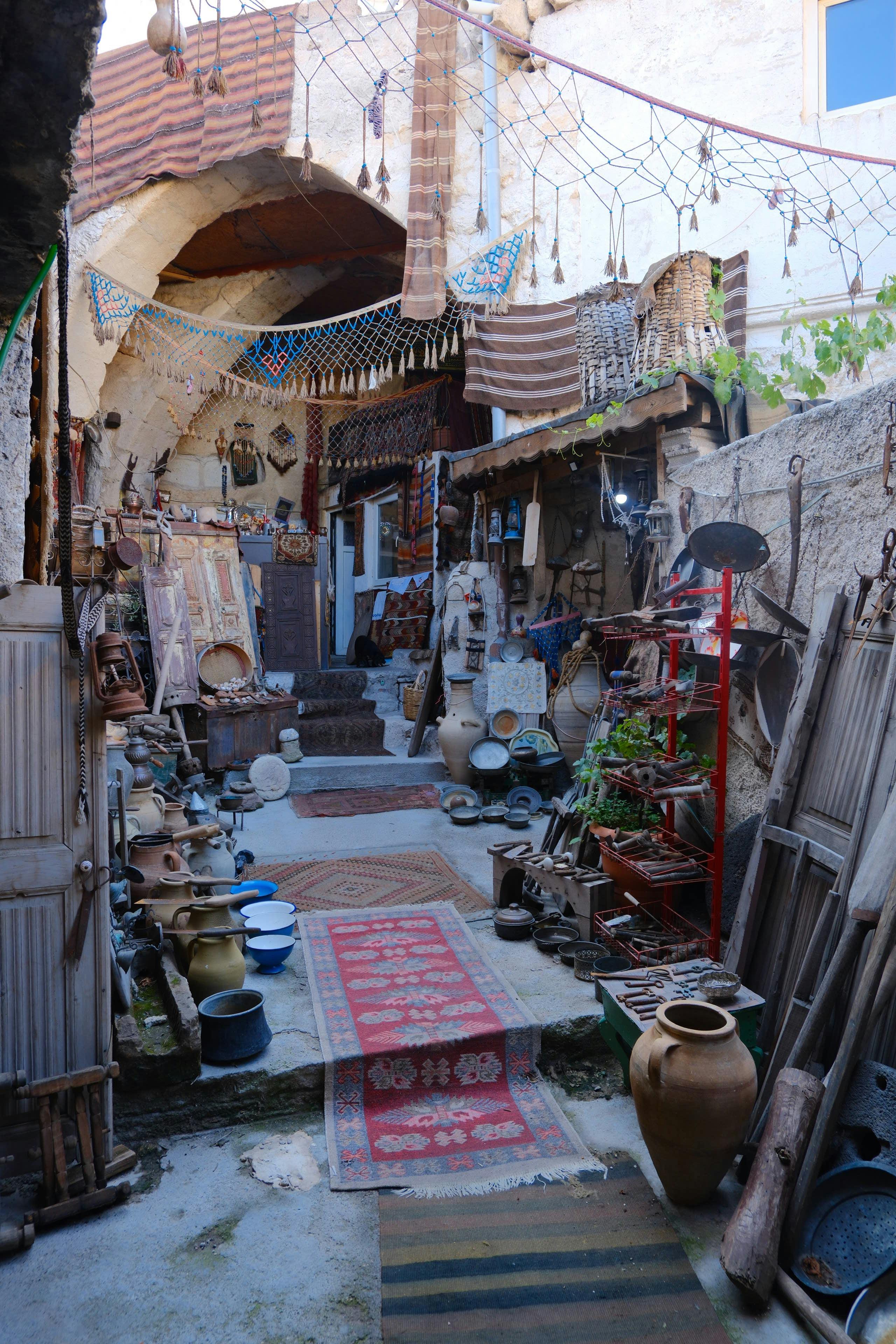 Explore a quaint antique alley filled with vintage decor and eclectic treasures.