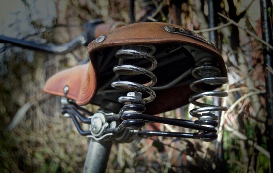 Shallow Focus Photography of Brown Bicycle Seat
