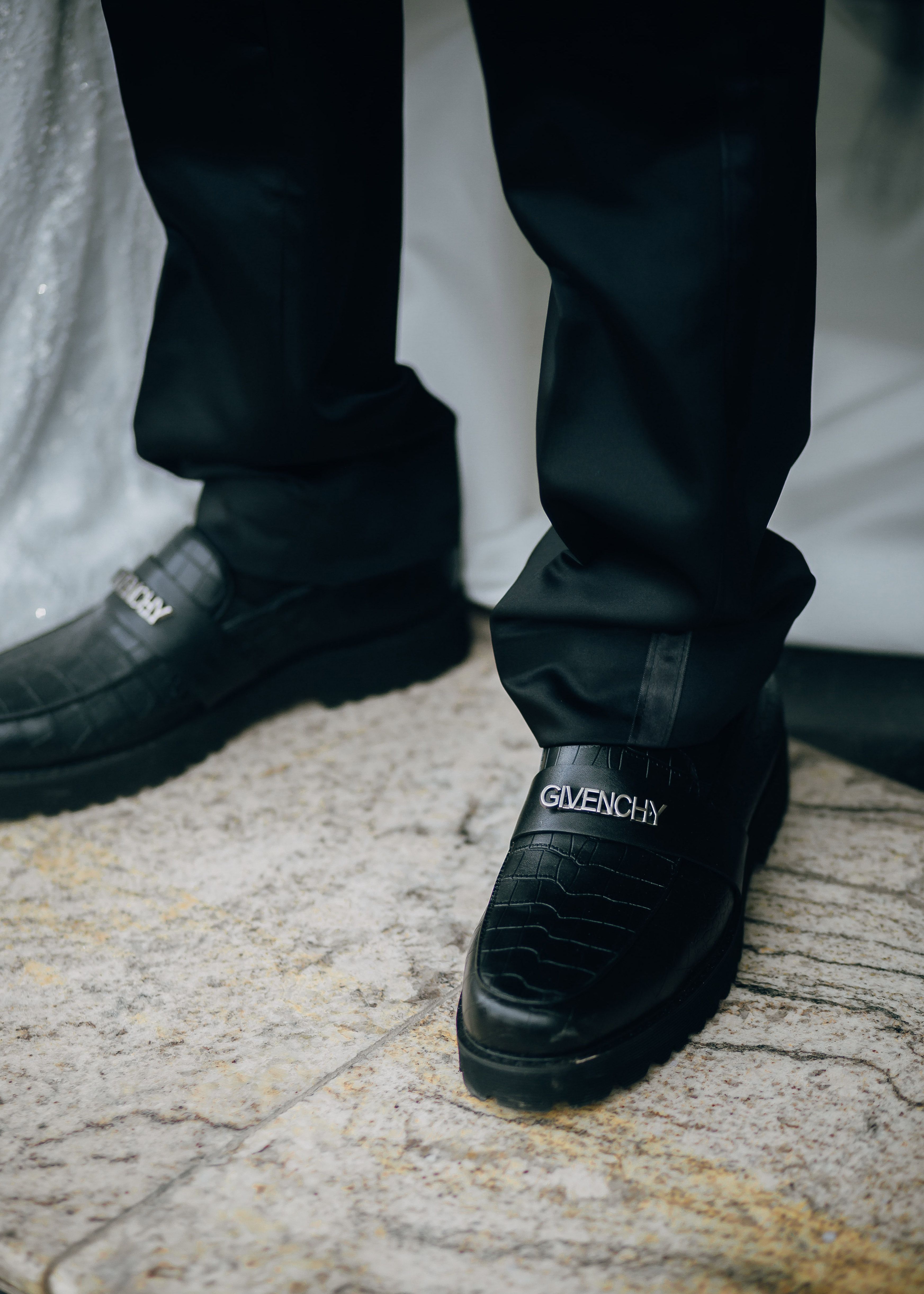 Elegant Black Givenchy Loafers on Textured Floor · Free  display picture 3