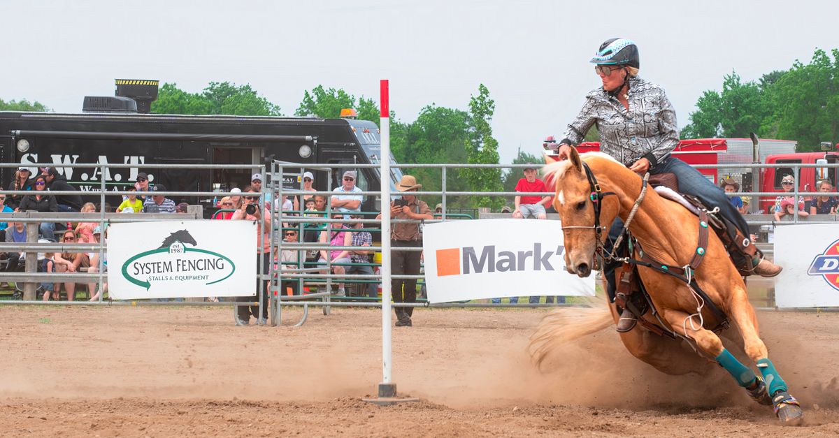 Dynamic Rodeo Barrel Racing Action Shot · Free Stock Photo