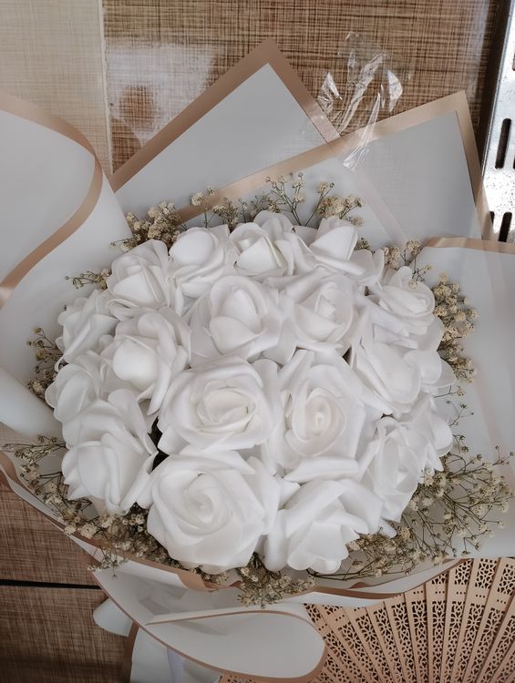 White Roses Color Wrapper Elegant White Rose Bouquet in Decorative Wrapping · Free Stock Photo