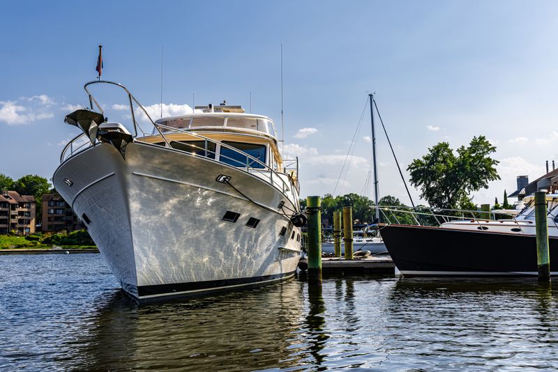 Luxury yachts docked in the Annapolis marina on a clear sunny day