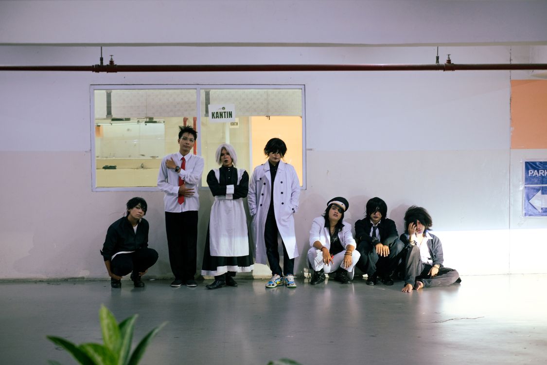 Cosplayer In House Group Cosplay in Urban Indoor Setting · Free Stock Photo