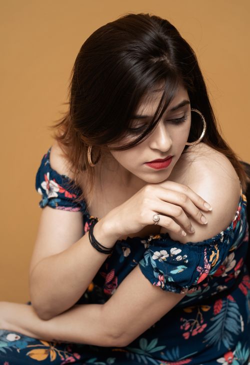 Free Captivating portrait of a woman in colorful dress, showcasing modern fashion in Delhi. Stock Photo