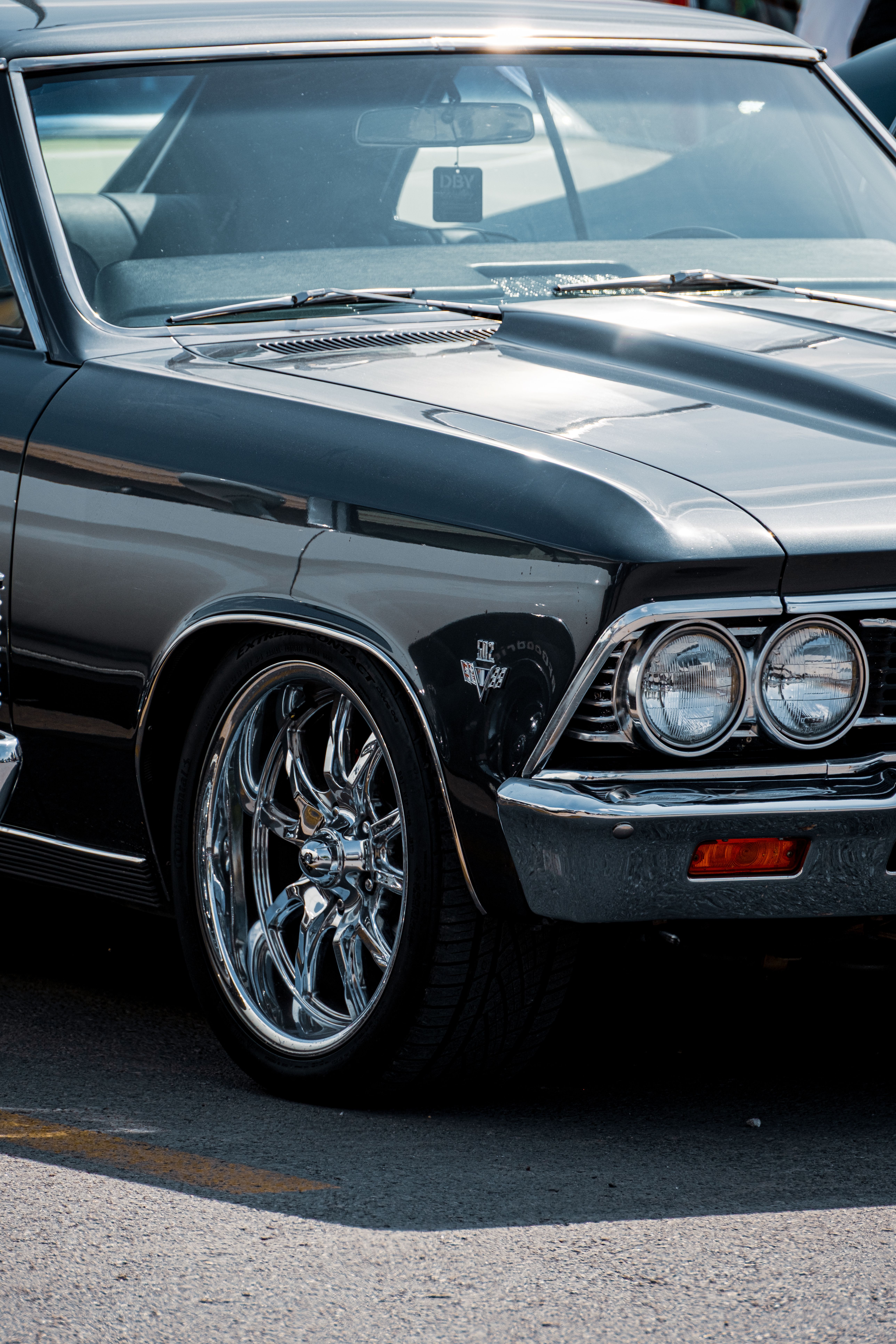 Classic Car Detail Shot with Chrome Rims · Free Stock Photo