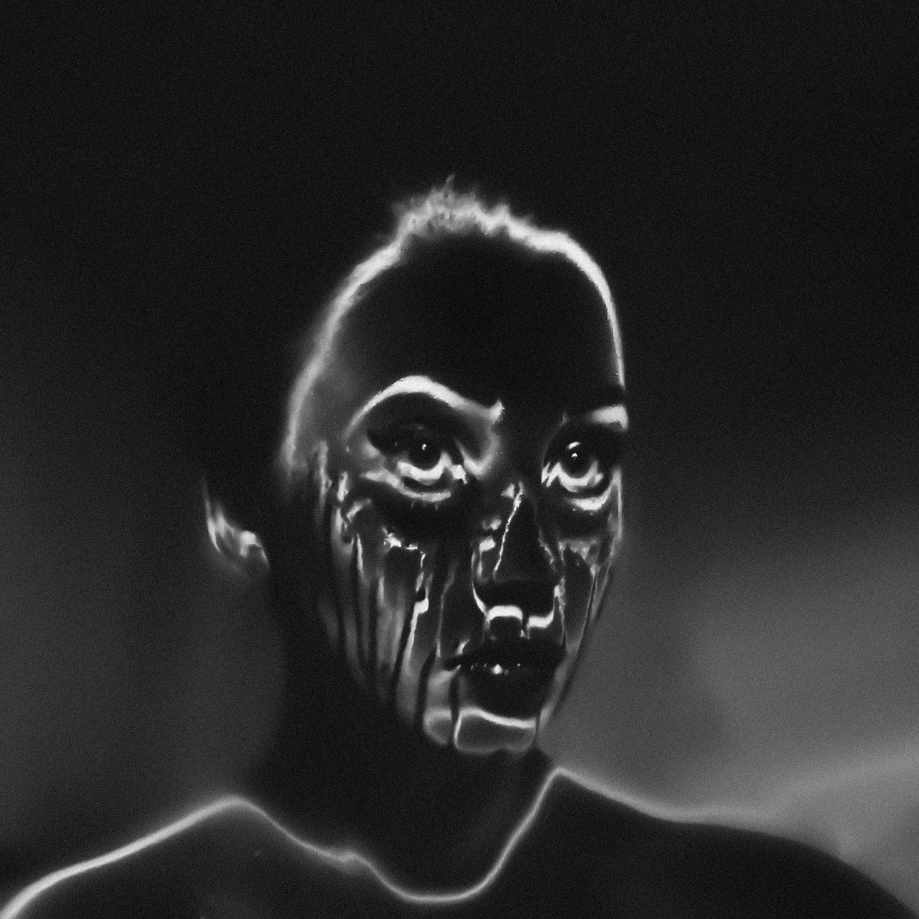 Intriguing monochrome portrait with an eerie and artistic abstract style.