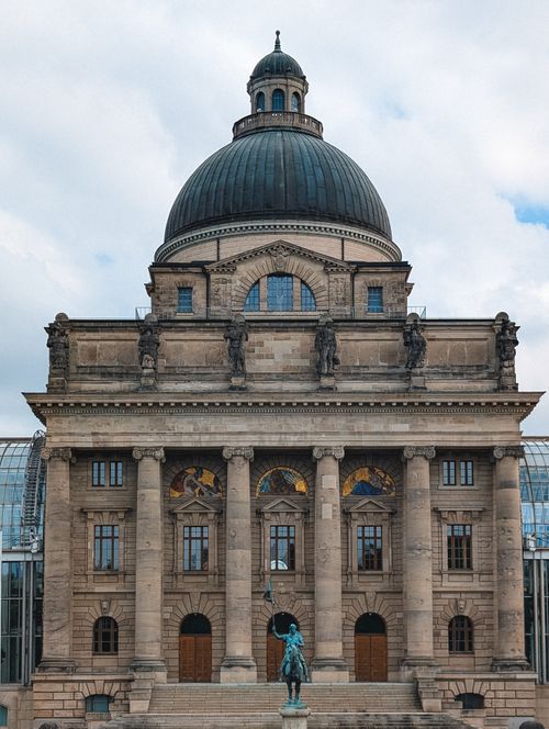 Free Architectural view of the Bavarian State Chancellery's grand neoclassical facade in Munich. Stock Photo