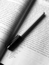 Open Book with Pen in Black and White