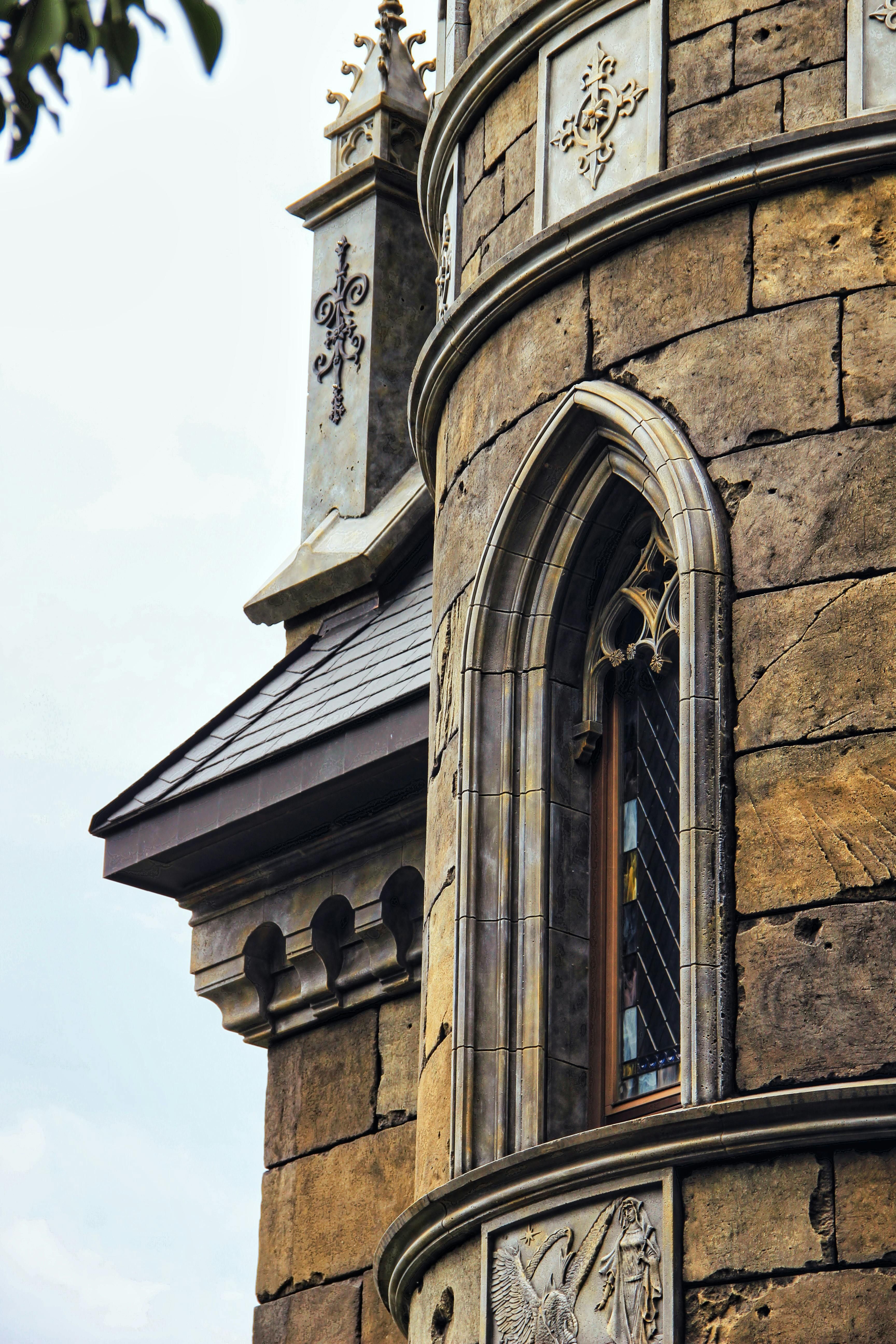 Historic Stone Castle Tower with Gothic Details · Free Stock Photo